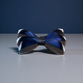 Nœud papillon en plumes creuses bleues