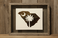 South Carolina feather art in gray wood grain frame against rustic barn wood background